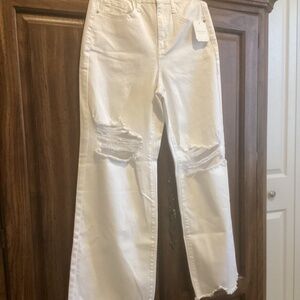 NWT Altar’d State white torn look and uneven hem jeans